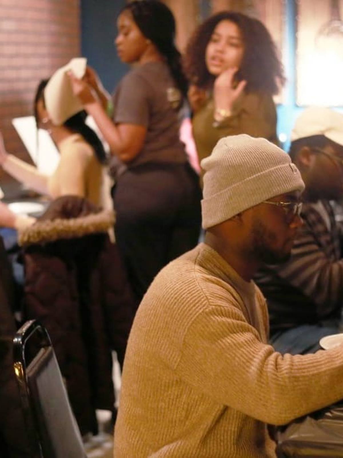 a group of people sitting at a table