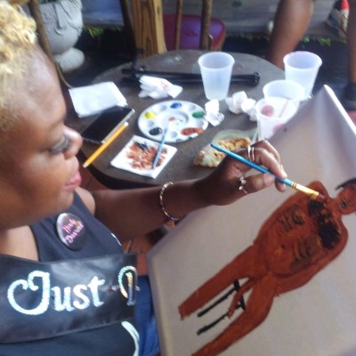 a small child sitting on a table