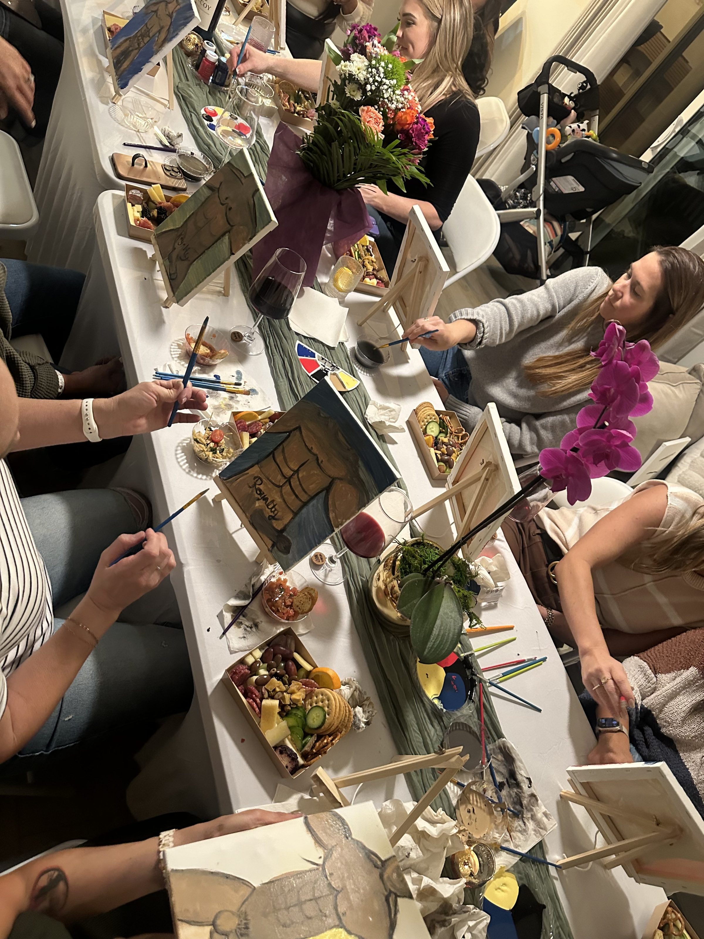 a woman cutting a cake